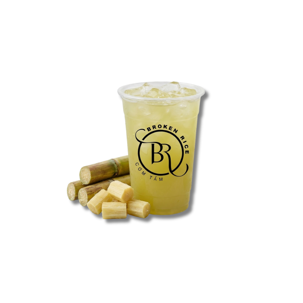 Sugarcane drink with ice and fresh sugarcane pieces